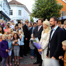 Crown Prince Haakon, Crown Princess Mette-Marit and County Governor Øystein Djupedal on their walk through Grimstad (Photo: Gorm Kallestad / Scanpix)